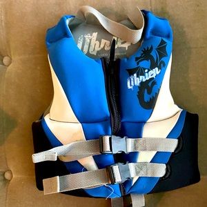 USCG rated life/ swim vest for 30-50 lb child. Includes strap btwn legs.